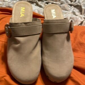 Beige clogs, worn one time